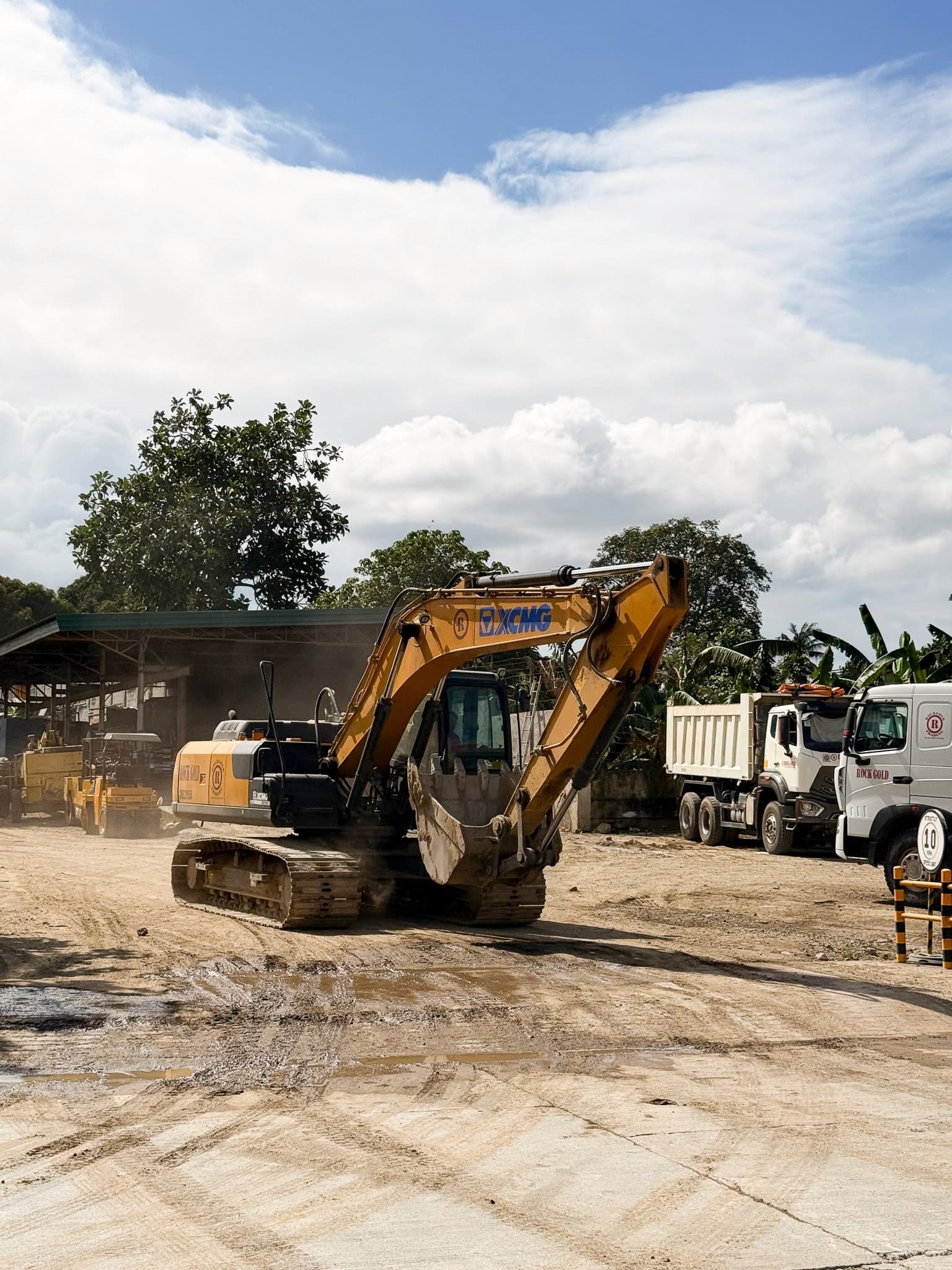Rock Gold excavator and dump trucks at the Batangas yard
