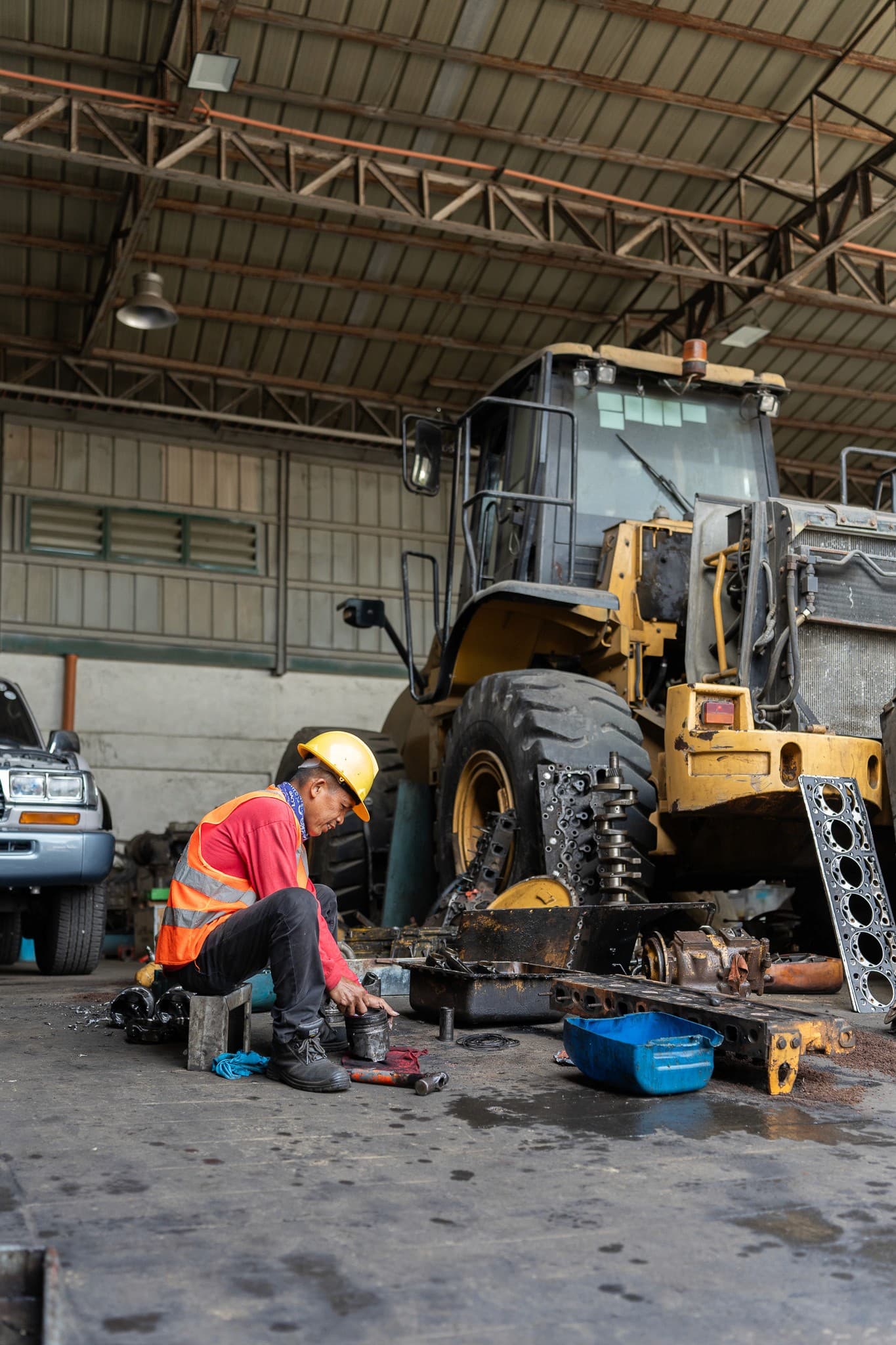 Rock Gold technician servicing a wheel loader in the workshop